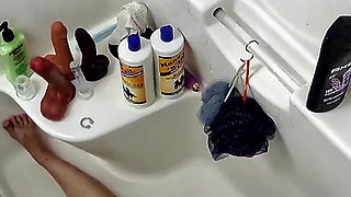 Pawg milf toys pussy in the shower