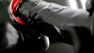 Rubberslut in the clinic masturbates with big dildo and deepthroats