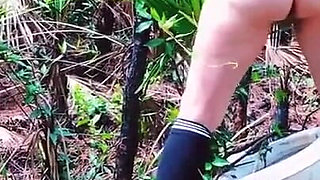 Peeing on a Toilet in the Woods