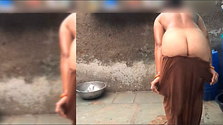 The elder sister-in-law is watching the brother-in-law in the open bathroom after going home naked after walking in the open for