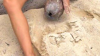 Masturbating on the Beach