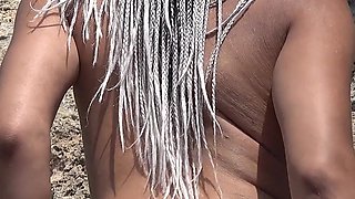 Beautiful and Tanned Girl Sucking a Loaded Dick on a Beach