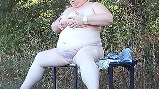 a friend in the park undresses and masturbates on a bench