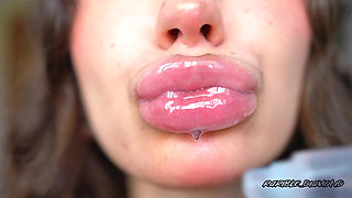 Wet Messy Lipgloss Layers and Pouting Kisses