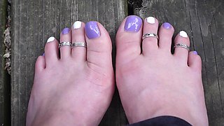 Purple and White Toes Wiggling Wearing Toe Rings
