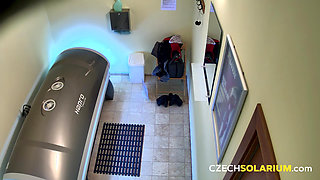 Czech Solarium 234: Young Redhead Shines in Solarium