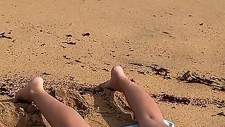 A Busty Blonde Is Walking and Sunbathing Naked