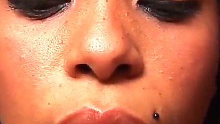 Ebony masturbating with her pink toy