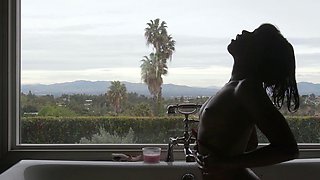 Ebony MILF Ana Foxxx posing nude outdoor