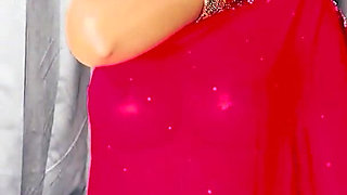 Dressed in a Full Indian Red Outfit and High Heels