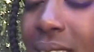 Horny Ebony Lesbians Share Toys and Tongues Outdoors