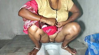 Aunty Pissing in Bathroom and I Caught and I See Her Big Pussy and Big Boobs