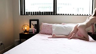 Pretty towheaded woman plays with her toys for a warm solo