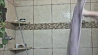 After a Hot Sshower Nurse Vicki Dries off and Does Some Other Grooming