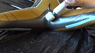 Latex Danielle is attached to the bed and masturbated with the massage vibrator