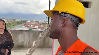 Black guy gets fucked by two beautiful girls on the terrace.
