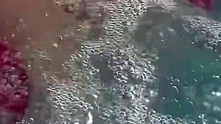 Artemisia Love Sexy and Horny Underwater Showing Her Big Tits in a Super Micro Bikini and You Can See Her Aureolas…