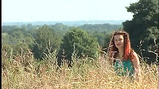 Busty redhead teen lifting dress outdoors