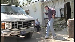 Two guys watch a slutty blond get fucked in her pussy by a machine