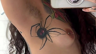Tattooed Girl with a Split Tongue Smells Her Hairy Armpits After Working Out