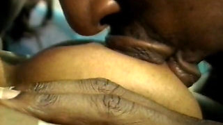 Black stud gets his huge cock sucked by ebony slut on the back seat of a bus