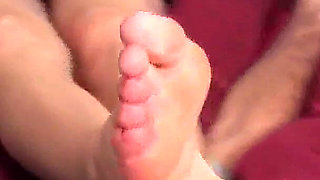 Two pairs of feet to suck