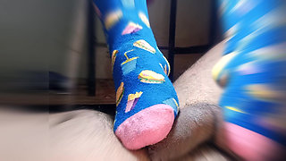 Straw with Feet Wearing Very Funny Stockings