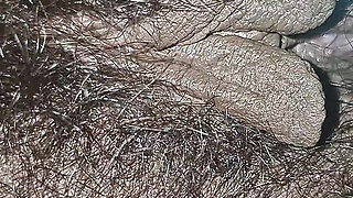 The village woman is showing her large pussy