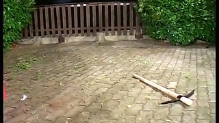 Mature and hairy woman gives a blowjob outdoor