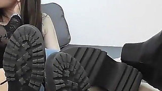 Two Beautiful Chicks Getting Their Feet Worshiped by a Masked Man