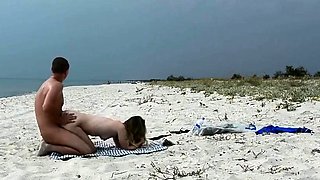 Amateur Nudist MILF Has Doggy-Style Fun at the Beach
