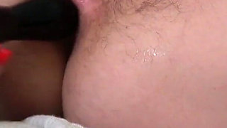 Hairy womanhood and anal dildo