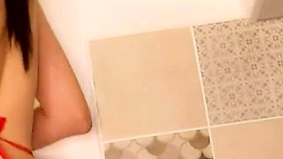 Hot housewife sexually rustles her apron in the kitchen
