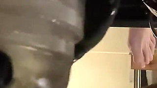 Close up Ruined Multiple Times Into a Glass on the Milking Table