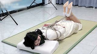 Girlfriend in a Dress and Stockings, Bound by Rope
