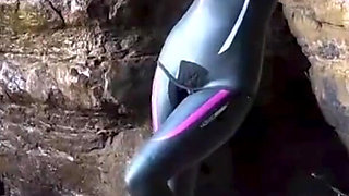 Shiny Rubber Wetsuit Tease in Private Cave