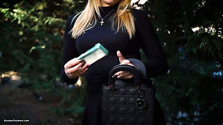 Hot Blonde Babe Smoking One Black Cigarettes in Nature