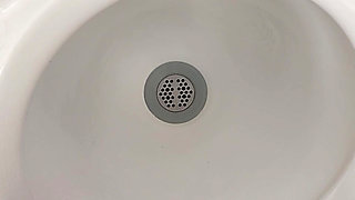 Moaning daddy has a lot of pressure and milks his cock in the public toilet
