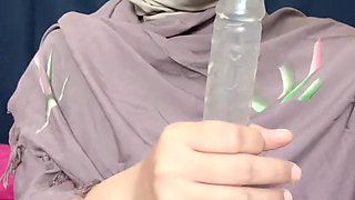 Women stimulated horny in room plays dildo