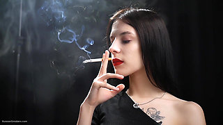 Slim Chick Is Smoking Two Reds