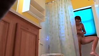 Stepdaughter 21 shaves pussy in shower (voyeur)