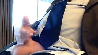 Suited Silver Fox Jerks Off Solo