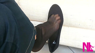 Dangling in Black Flats and Black Nylon Socks
