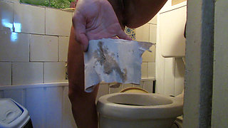 I pee in the toilet and stuff my thong into my cunt