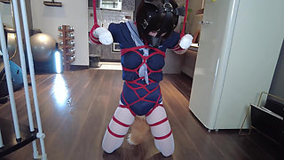 Mz31 - a Girl Tied and Suspended by a Red Rope Reaches Orgasm.